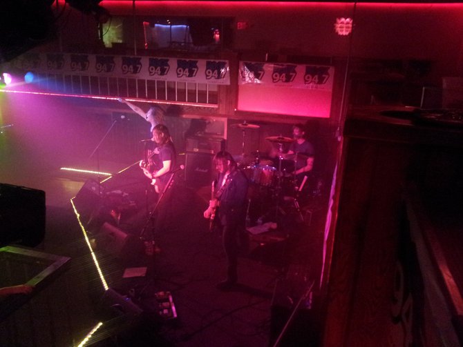 On drums, Tyler Coburn, Bass-Dean Pizzazz, Lead Vocalist-Mitch Arnold and Lead Guitar-Mitch Arnold.
