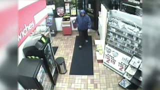 Surveillance photo of the suspect in the armed robbery of the Appleton Marathon gas station at 405 S. Memorial Drive on Thursday April 19, 2012. Surveillance photo of the suspect in the armed robbery of the Appleton Marathon gas station at 405 S. Memorial Drive on Thursday April 19, 2012.