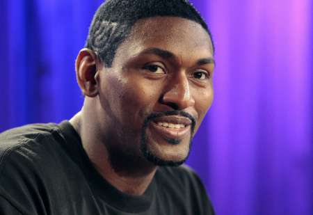Los Angeles Lakers' Metta World Peace, formerly known as Ron Artest, smiles during a news conference in Los Angeles, California September 21, 2011. World Peace and his non-profit organization Xcel University gave away $285,000 in proceeds from the sale of his 2010 Los Angeles Lakers NBA championship ring to mental health charities from around the country. REUTERS/Jason Redmond (UNITED STATES - Tags: SPORT BASKETBALL ENTERTAINMENT) Los Angeles Lakers' Metta World Peace, formerly known as Ron Artest, smiles during a news conference in Los Angeles, California September 21, 2011. World Peace and his non-profit organization Xcel University gave away $285,000 in proceeds from the sale of his 2010 Los Angeles Lakers NBA championship ring to mental health charities from around the country. REUTERS/Jason Redmond (UNITED STATES - Tags: SPORT BASKETBALL ENTERTAINMENT)
