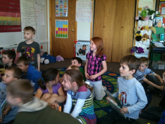 After pizza- the students read to Craig, Justin and the class.