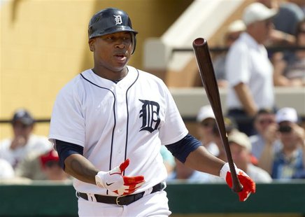 Detroit Tigers' Delmon Young flips his bat after swinging for strike during the second inning of their MLB spring training game against the Detroit Tigers' Delmon Young flips his bat after swinging for strike during the second inning of their MLB spring training game against the