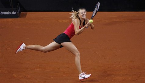 Russia's Maria Sharapova hits a backhand to Belarus' Victoria Azarenka during their women's singles final match at the WTA tennis tournament Russia's Maria Sharapova hits a backhand to Belarus' Victoria Azarenka during their women's singles final match at the WTA tennis tournament
