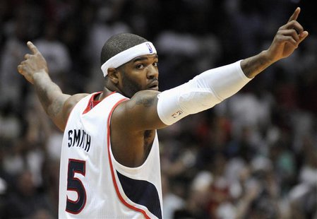 Atlanta Hawks forward Josh Smith reacts after a shot in the first half during their game against the Boston Celtics in Game One of their NBA Atlanta Hawks forward Josh Smith reacts after a shot in the first half during their game against the Boston Celtics in Game One of their NBA