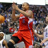 Los Angeles Clippers forward Caron Butler (C) looses the ball as he drives the lane on Dallas Mavericks guard Jason Kidd (R) while guard Jas Los Angeles Clippers forward Caron Butler (C) looses the ball as he drives the lane on Dallas Mavericks guard Jason Kidd (R) while guard Jas
