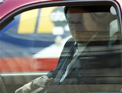 Former U.S. Senator John Edwards sits in a vehicle after leaving the federal court house in Greensboro, North Carolina April 24, 2012. REUTE Former U.S. Senator John Edwards sits in a vehicle after leaving the federal court house in Greensboro, North Carolina April 24, 2012. REUTE