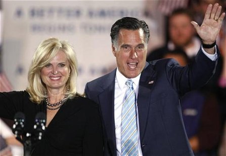 Republican presidential candidate former Massachusetts Governor Mitt Romney waves with his wife Ann after his speech at a primary night rall Republican presidential candidate former Massachusetts Governor Mitt Romney waves with his wife Ann after his speech at a primary night rall
