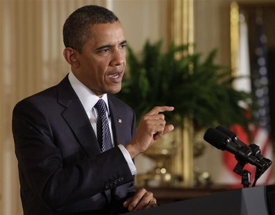 U.S. President Barack Obama gestures during a news conference with Japanese Prime Minister Yoshihiko Noda (not in photo) during a joint news U.S. President Barack Obama gestures during a news conference with Japanese Prime Minister Yoshihiko Noda (not in photo) during a joint news