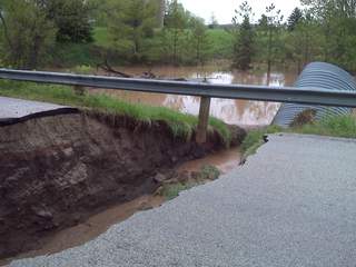 Giant sinkhole on Cemetary Road near Forest Junction on May 3, 2012. (courtesy of FOX 11).