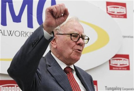 Berkshire Hathaway Chairman Warren Buffett shouts the slogan "Never give up, Iwaki" in Japanese, in response to a request from a local telev Berkshire Hathaway Chairman Warren Buffett shouts the slogan "Never give up, Iwaki" in Japanese, in response to a request from a local telev
