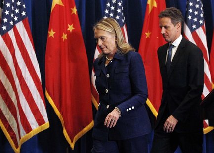 U.S. Secretary of State Hillary Clinton (L) and U.S. Treasury Secretary Timothy Geithner leave the stage of a news conference in Beijing May U.S. Secretary of State Hillary Clinton (L) and U.S. Treasury Secretary Timothy Geithner leave the stage of a news conference in Beijing May