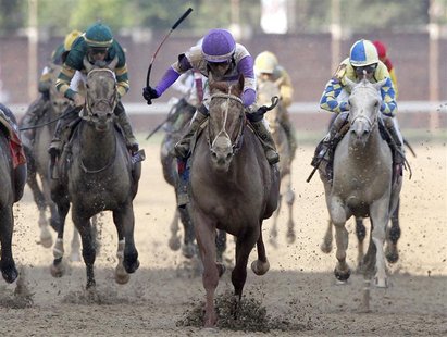 I'll Have Another with jockey Mario Gutierrez (C) in the irons wins the 138th Kentucky Derby ahead of Bodemeister at Churchill Downs in Loui I'll Have Another with jockey Mario Gutierrez (C) in the irons wins the 138th Kentucky Derby ahead of Bodemeister at Churchill Downs in Loui