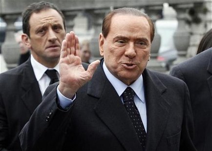 Italy's former Prime Minister Silvio Berlusconi arrives for a meeting of the European People's Party (EPP) ahead of a two-day European Union Italy's former Prime Minister Silvio Berlusconi arrives for a meeting of the European People's Party (EPP) ahead of a two-day European Union