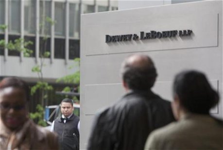People walk past a sign outside the law firm Dewey & LeBoeuf in New York City May 1, 2012. REUTERS/Lee Celano People walk past a sign outside the law firm Dewey & LeBoeuf in New York City May 1, 2012. REUTERS/Lee Celano