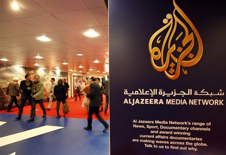 The logo of Al Jazeera Media Network is seen at the MIPTV, the International Television Programs Market, event in Cannes April 2, 2012. REUT The logo of Al Jazeera Media Network is seen at the MIPTV, the International Television Programs Market, event in Cannes April 2, 2012. REUT