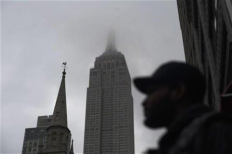 Clouds cover the Empire State Building in New York, May 3, 2012. REUTERS/Keith Bedford Clouds cover the Empire State Building in New York, May 3, 2012. REUTERS/Keith Bedford