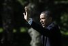 U.S. President Barack Obama waves as he walks out from the Oval Office of the White House in Washington May 10, 2012, before his departure t