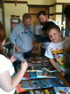Picking out books.