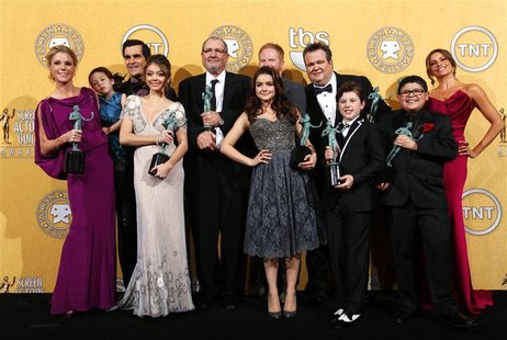 The cast of "Modern Family" pose backstage after the show won outstanding performance by an ensemble in a comedy series at the 18th annual S The cast of "Modern Family" pose backstage after the show won outstanding performance by an ensemble in a comedy series at the 18th annual S