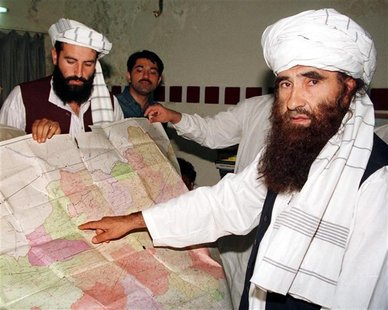 Jalaluddin Haqqani (R), the Taliban's Minister for Tribal Affairs, points to a map of Afghanistan during a visit to Islamabad, Pakistan whil Jalaluddin Haqqani (R), the Taliban's Minister for Tribal Affairs, points to a map of Afghanistan during a visit to Islamabad, Pakistan whil