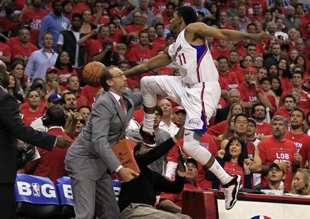 Los Angeles Clippers' Nick Young crashes into the bench during Game 6 of their NBA Western Conference basketball playoff series against Memp Los Angeles Clippers' Nick Young crashes into the bench during Game 6 of their NBA Western Conference basketball playoff series against Memp