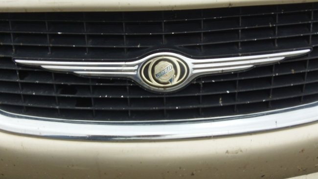 Don't worry. They'll wash the bugs off this Chrysler before you buy it. ~TS