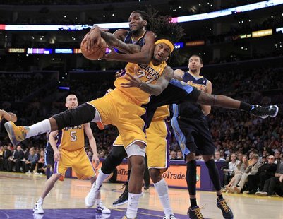 Los Angeles Lakers' Jordan Hill fights for a rebound with Denver Nuggets' Kenneth Faried (front) during Game 7 of their NBA Western Conferen Los Angeles Lakers' Jordan Hill fights for a rebound with Denver Nuggets' Kenneth Faried (front) during Game 7 of their NBA Western Conferen
