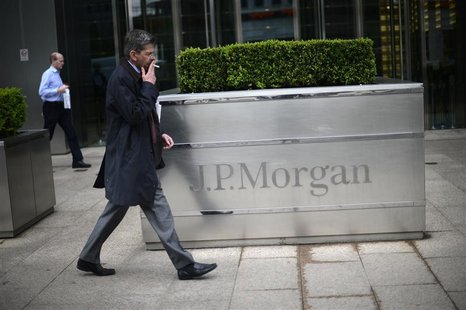 A man walks past the JP Morgan headquarters at Canary Wharf in London May 11, 2012. REUTERS/Dylan Martinez A man walks past the JP Morgan headquarters at Canary Wharf in London May 11, 2012. REUTERS/Dylan Martinez