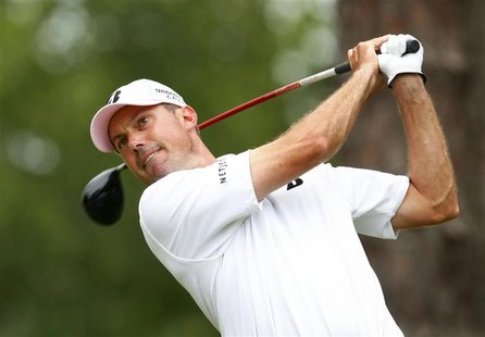 Matt Kuchar of the U.S. watches his tee shot on the second hole during the final round of the Players Championship PGA golf tournament at TP Matt Kuchar of the U.S. watches his tee shot on the second hole during the final round of the Players Championship PGA golf tournament at TP