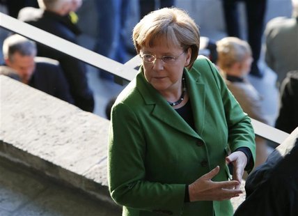 German Chancellor Angela Merkel arrives for the German DFB Cup (DFB Pokal) final soccer match between Borussia Dortmund and Bayern Munich at German Chancellor Angela Merkel arrives for the German DFB Cup (DFB Pokal) final soccer match between Borussia Dortmund and Bayern Munich at
