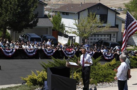 President Barack Obama speaks to the neighbors after meeting with homeowners Val and Paul Keller to discuss the housing crisis in Nevada at President Barack Obama speaks to the neighbors after meeting with homeowners Val and Paul Keller to discuss the housing crisis in Nevada at