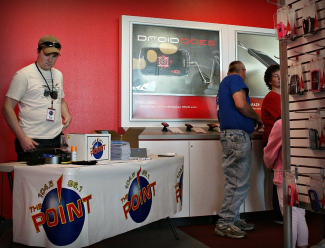 Point team member Alan makes sure we're ready to go for the giveaway.