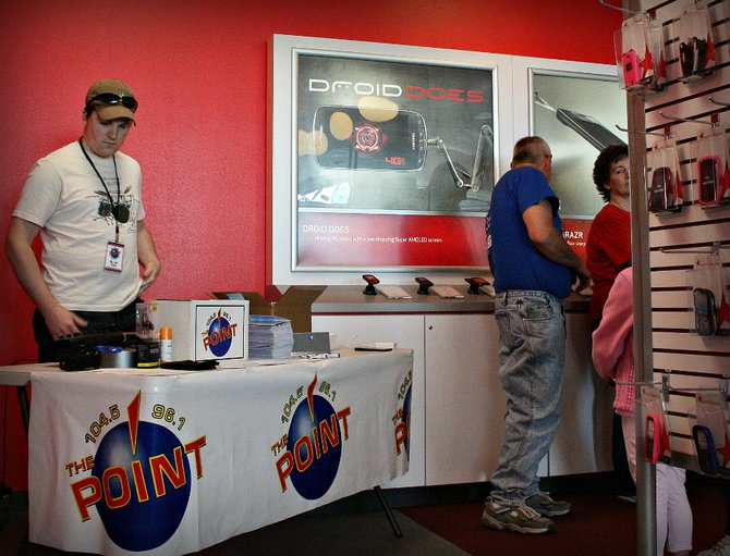 Point team member Alan makes sure we're ready to go for the giveaway.
