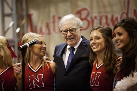 Warren Buffett sings with University of Nebraska cheerleaders during the Berkshire Hathaway Annual shareholders meeting in Omaha, May 5, 201 Warren Buffett sings with University of Nebraska cheerleaders during the Berkshire Hathaway Annual shareholders meeting in Omaha, May 5, 201