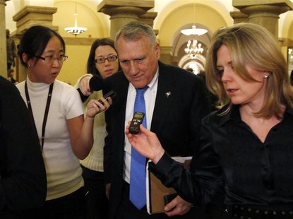 Super committee member Senator Jon Kyl (R-AZ) talks to reporters after a meeting with Republican committee members on Capitol Hill in Washin Super committee member Senator Jon Kyl (R-AZ) talks to reporters after a meeting with Republican committee members on Capitol Hill in Washin