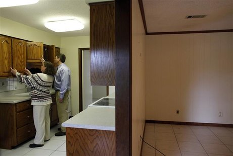 Daniel and Robin Akerman inspect their new house after buying in short sale in Pensacola, Florida. REUTERS/Carlos Barria Daniel and Robin Akerman inspect their new house after buying in short sale in Pensacola, Florida. REUTERS/Carlos Barria