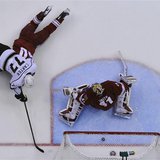 Los Angeles Kings' Jeff Carter (77) scores on Phoenix Coyotes' goalie Mike Smith (41) while falling on top of Coyotes' Antoine Vermette duri Los Angeles Kings' Jeff Carter (77) scores on Phoenix Coyotes' goalie Mike Smith (41) while falling on top of Coyotes' Antoine Vermette duri