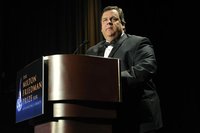 New Jersey Governor Chris Christie takes the stage for delivering remarks at the Friedman Prize dinner in Washington, May 4, 2012. REUTERS/J