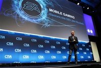 John Riccitiello, CEO of Electronic Arts, addresses attendees during the International CTIA WIRELESS Conference & Exposition in New Orleans,