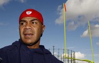 New England Patriots Junior Seau speaks to reporters before training at the Oval Cricket Ground ahead of their NFL game against Tampa Bay Bu