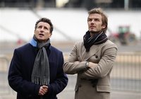 British soccer player David Beckham (R) and the Chair of the London 2012 Organising Committee, Sebastian Coe, pose for a photograph during a