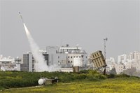 An Iron Dome launcher fires an interceptor rocket near the southern city of Ashdod March 12, 2012. REUTERS/Nir Elias