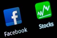 A Facebook application logo is pictured on a mobile phone in this photo illustration taken in Lavigny May 16, 2012. REUTERS/Valentin Flaurau