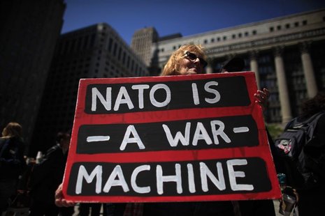 A protester takes part in one of the demonstrations during the week ahead of the NATO meeting in Chicago, May 16, 2012. REUTERS/Jim Young A protester takes part in one of the demonstrations during the week ahead of the NATO meeting in Chicago, May 16, 2012. REUTERS/Jim Young