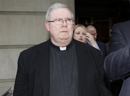 Monsignor William Lynn returns to the courthouse after lunch recess on the opening day of his child sex abuse trial in Philadelphia, Pennsyl Monsignor William Lynn returns to the courthouse after lunch recess on the opening day of his child sex abuse trial in Philadelphia, Pennsyl