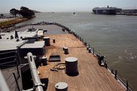 A man works around the rail near the stern of the U.S. battleship "USS Iowa" in Richmond, California May 17, 2012. REUTERS/Robert Galbraith