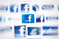 Facebook logos on a computer screen are seen in this photo illustration taken in Lavigny May 16, 2012. REUTERS/Valentin Flauraud