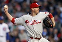 Philadelphia Phillies starting pitcher Roy Halladay throws against the Chicago Cubs in the first inning during their MLB National League bas