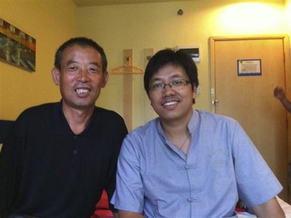 A handout photo shows Chen Guangfu (L), elder brother of blind activist Chen Guangcheng and father of Chen Kegui, posing with Guo Yushan (R) A handout photo shows Chen Guangfu (L), elder brother of blind activist Chen Guangcheng and father of Chen Kegui, posing with Guo Yushan (R)