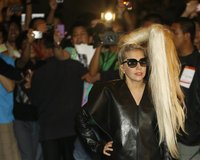 U.S. singer Lady Gaga poses for photographers upon arrival for her concert in Manila May 19, 2012. REUTERS/Cheryl Ravelo