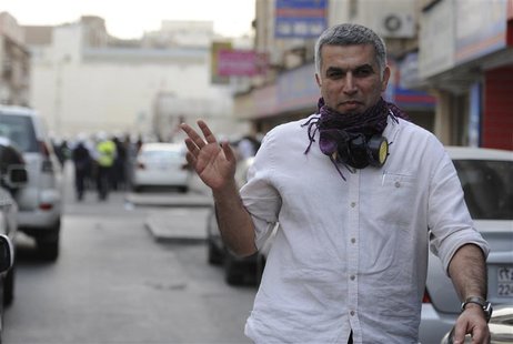 Bahrian's Human Rights Activits, Nabeel Rajab, gives a victory sign during an anti-government protest held in downtown Manama February 11, 2 Bahrian's Human Rights Activits, Nabeel Rajab, gives a victory sign during an anti-government protest held in downtown Manama February 11, 2